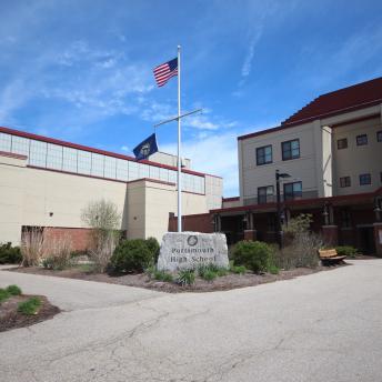 Portsmouth High School sign and flags